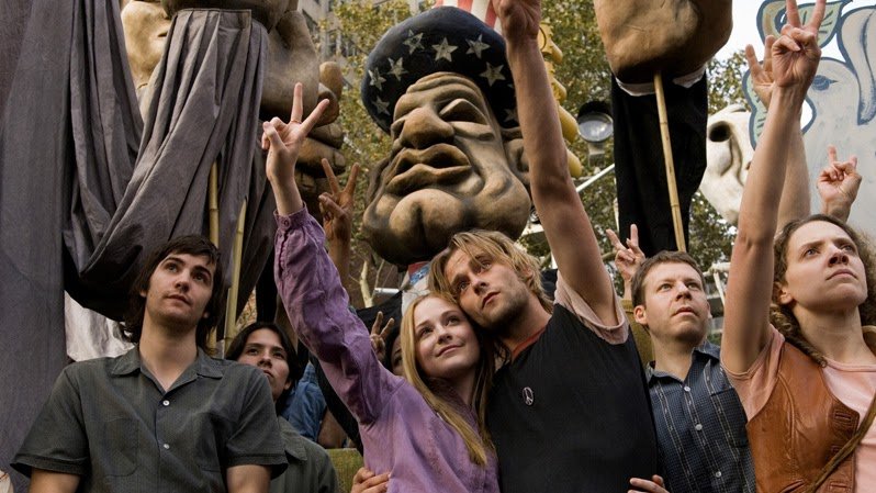 A quiet domestic corner with records and devotional imagery.