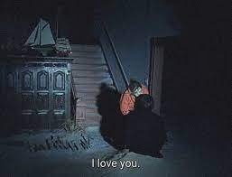 A quiet domestic corner with records and devotional imagery.