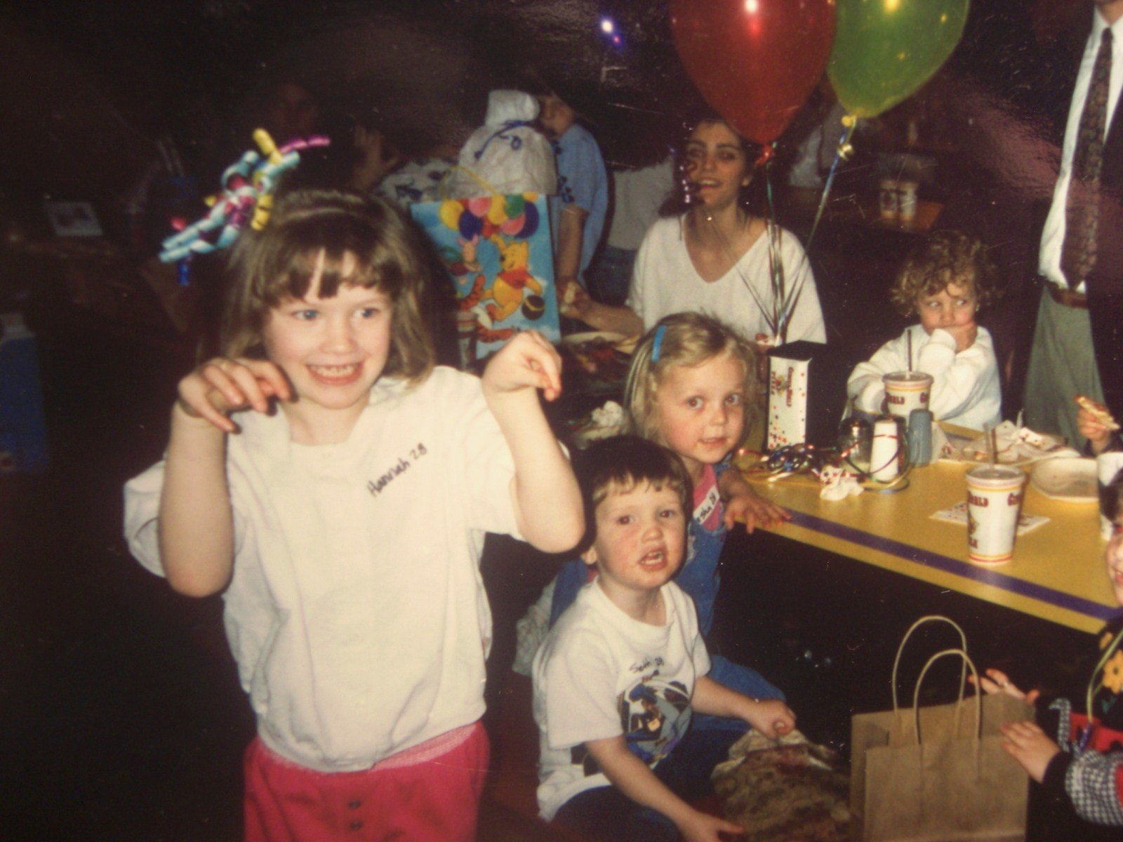 A quiet domestic corner with records and devotional imagery.